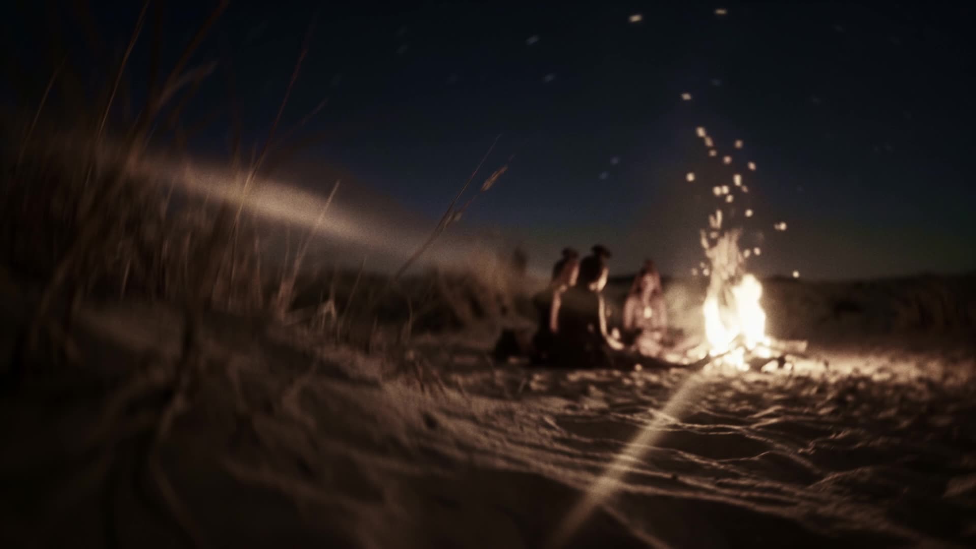 NGONI still: fire on the shore at night